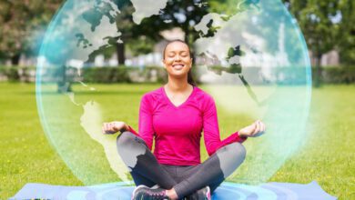 sport meditation park lifestyle concept smiling woman meditating mat outdoors