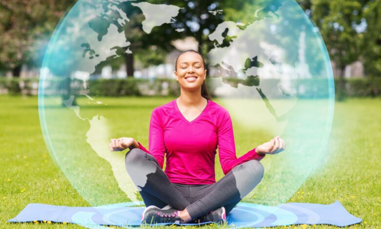 sport meditation park lifestyle concept smiling woman meditating mat outdoors