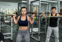 two people gym making exercise together 1