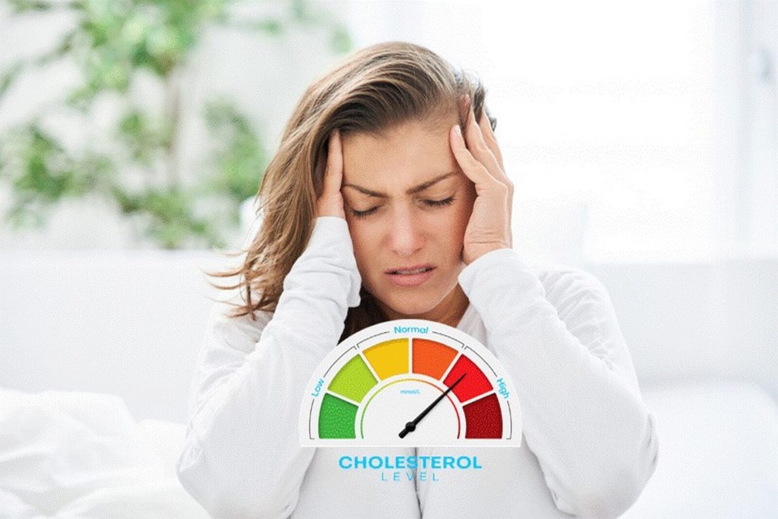 Woman experiencing headache due to high cholesterol levels