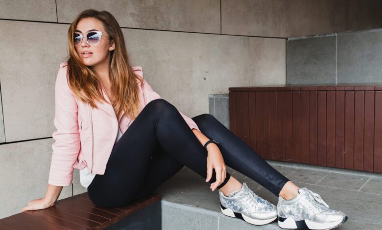 young beautiful stylish hipster woman in pink leather jacket